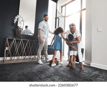 Family, grandmother and children hug as greeting in a home or house due to grandparent visit on holiday or vacation. Kids, grandchildren and elderly woman embrace feeling excited, happy and happiness - Shutterstock ID 2260382677