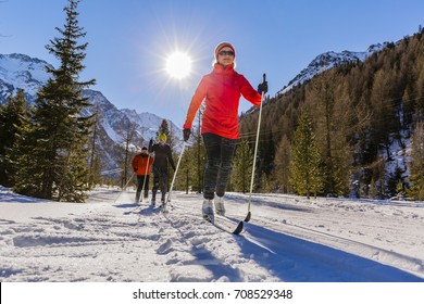 A family group of cross country skiers on a sunny winter morning in Italy Alps, Souty Tirol, Solda.