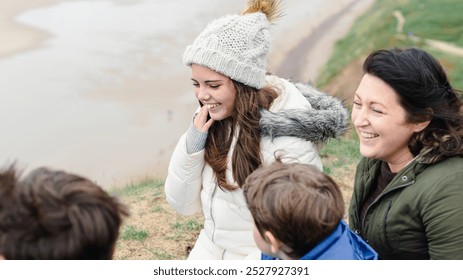 Family group enjoy scenic view in nature, winter travel outdoors. Happy family in winter clothes travel outdoors, enjoy nature landscape view, smile and laugh. Happy family smile in nature landscape - Powered by Shutterstock