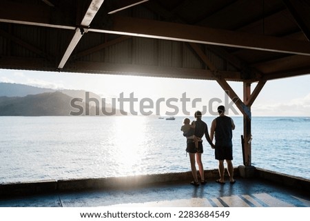 Family at Hanalei Bay Sunset