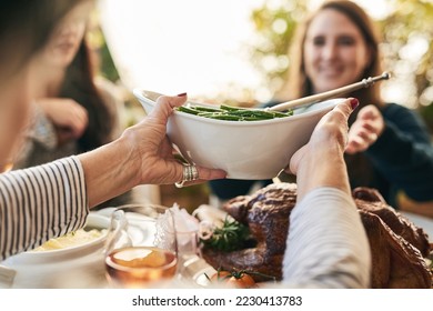 Family hands, thanksgiving food and green beans salad in holiday celebration, social lunch or dinner gathering in house, home or restaurant. Zoom, woman or festive friends sharing vegetables and meat - Powered by Shutterstock