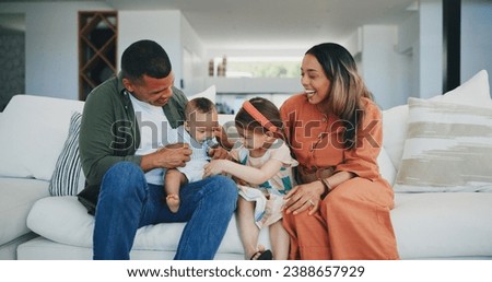 Family, happiness and play on couch, smile and joy or love, bonding and humor or comedy, sofa and fun. Happy parents and children, laughing and support at home, silly and goofy or tickle a baby