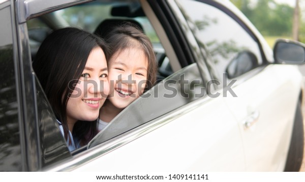 Family are happy to drive, Family are traveling
by car, family concept