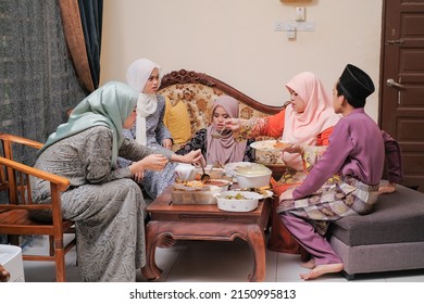 A Family Hari Raya Aidilfitri Eid-Ul-Fitr Meal and Celebration in Malaysia .Family, Happiness and Forgiveness Concept.