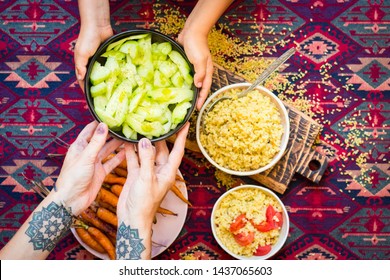 Family Have, Eat Meal Together. Adult And Child, Kid Hands. Rich Vegetarian, Vegan Lunch Or Dinner With Baked Carrots, Vegetables Salad And Cooked Bulgur Grain In Bowls. 