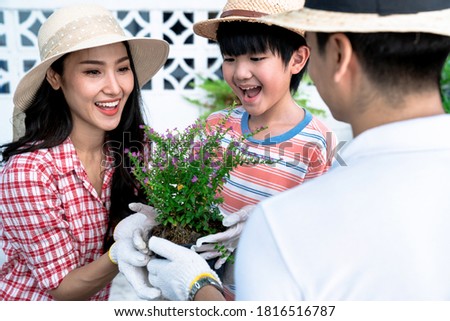 Family have fun in the work of gardening, Family spent time together.