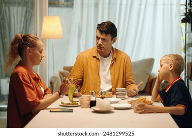 Family Having An Argument During Dinner - Powered by Shutterstock