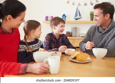 Family Having A Bowl Of Soup For Lunch