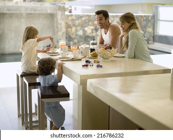 A Family Having Breakfast.