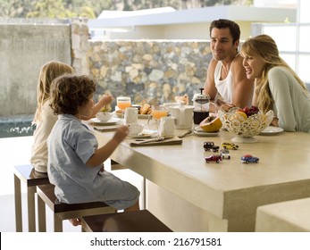 A Family Having Breakfast.