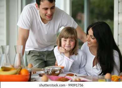 Family Having Breakfast Together