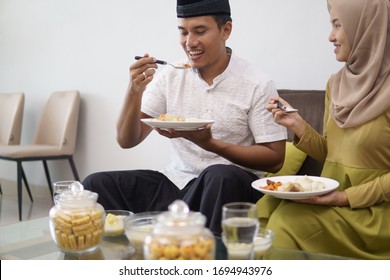 Family Having Early Breakfast Before Dawn. Sahoor Or Sahur On Ramadan