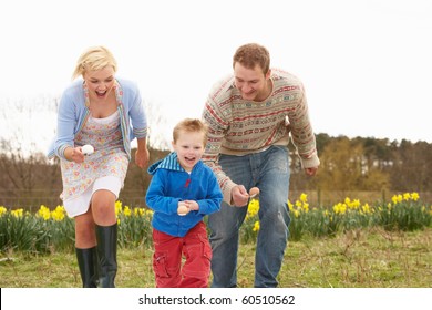 Family Having Egg And Spoon Race - Powered by Shutterstock