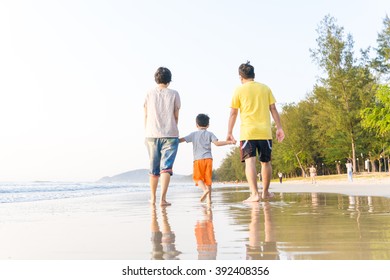 Family Having Fun On A Sandy Beach, Happy Beautiful Family