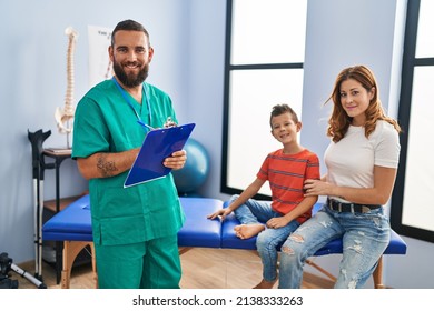 Family having physiotherapy session at rehab clinic - Shutterstock ID 2138333263