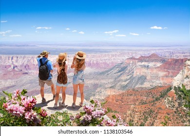 Family Hiking On Vacation,relaxing On Top Of The Mountain, Looking At Beautiful Summer Mountains Landscape. North Rim. Grand Canyon National Park, Arizona, USA.