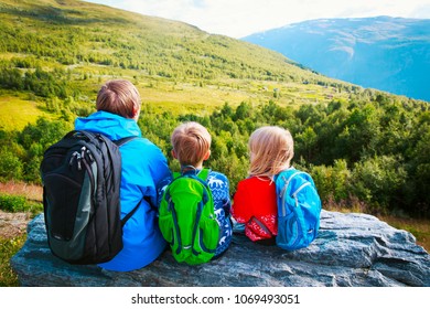 Family Hiking Travel In Mountains, Norway