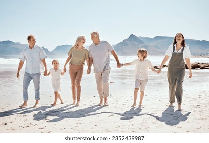 Family holding hands on beach, generations and adventure with grandparents, parents and kids outdoor. Happiness, travel and sea with love and care, people on holiday with trust and support in nature - Powered by Shutterstock