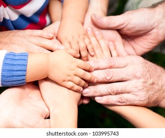 Family Holding Hands Together Closeup