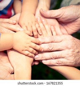 Family Holding Hands Together Closeup