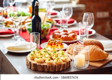 Family Holiday Festive Table Setting With Healthy Sandwiches, Bread And Appetizers, Selective Focus. Christmas, New Year, Thanksgiving, Anniversary, Hanukkah, Easter, Food Delivery Concept