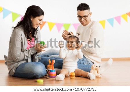 Similar – Image, Stock Photo Mother and baby playing around the Christmas Tree