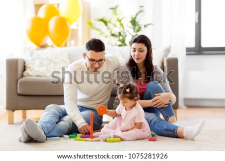 Similar – Image, Stock Photo Mother and baby playing around the Christmas Tree