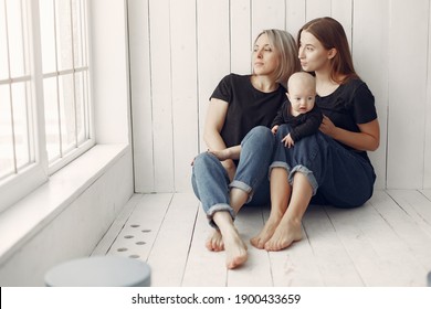 Family At Home. Grandmother With Daughter And Grandson. Women In A Black T-shirts.