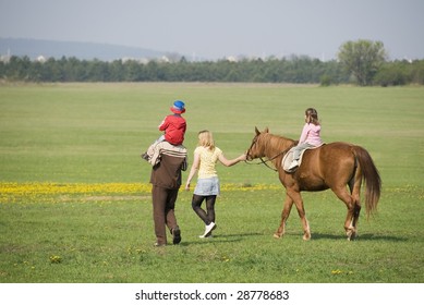 Family And Horse