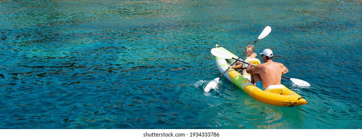 Family Kayaking, Father And Son Paddling In Kayak On Mediterranean Sea Canoe Tour, Having Fun, Outdoor Activities With Children In Greece