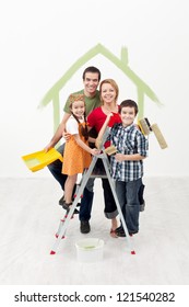 Family With Kids Painting Their New Home - Smiling And Holding Utensils