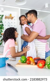 Family In Kitchen Making Morning Breakfast Together. Happy Family In The Kitchen Having Fun And Cooking Together. Healthy Food At Home.