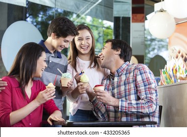 Family Laughing While Having Ice Creams In Parlor - Powered by Shutterstock