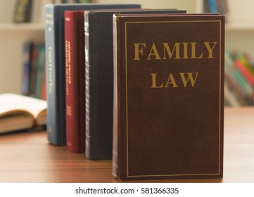 Family Law Books On Desk In The Law Firm. Legal Education Concept.