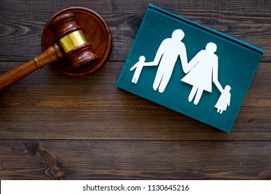 Family Law, Family Right Concept. Child-custody Concept. Family With Children Cutout Near Court Gavel On Dark Wooden Background Top View Copy Space