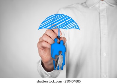 Family Life Insurance, Family Services And Family Policy Concepts. Insurance Agent Draw Umbrella (insurance Symbol) Above Family Icon.