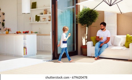 Family Lifestyle On Summer Patio, Open Space Kitchen