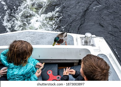 Family At The Loch Ness, A Large, Deep, Freshwater Loch In The Scottish Highlands Southwest Of Inverness, UK