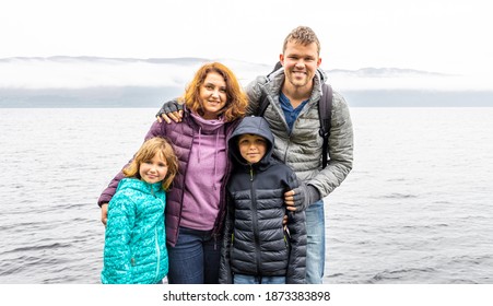 Family At The Loch Ness, A Large, Deep, Freshwater Loch In The Scottish Highlands Southwest Of Inverness, UK