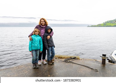 Family At The Loch Ness, A Large, Deep, Freshwater Loch In The Scottish Highlands Southwest Of Inverness, UK