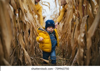 Family Look  Clothe Child Walking Through Corn Field