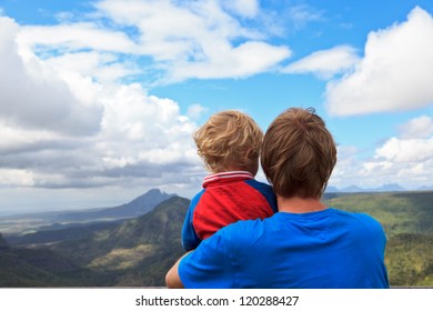 Family looking at mountains of Mauritius - Shutterstock ID 120288427