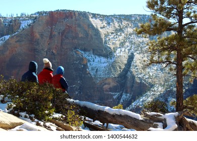 Family Looking Out In Zion National Park