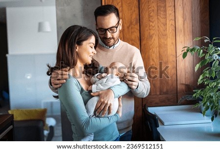 Family love parenthood baby concept. Parents spend happy moments with the newborn child
