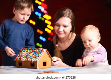 Family Making Gingerbread House