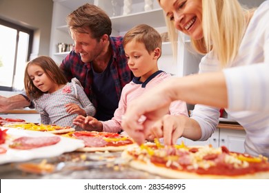 Family Making Pizza Together
