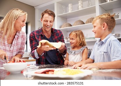 Family Making Pizza Together