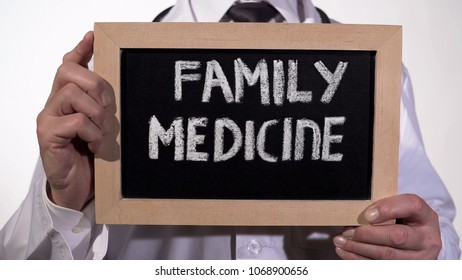 Family Medicine Text On Blackboard In Physician Hands, Comprehensive Healthcare, Stock Footage