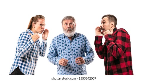 Family Members Arguing With One Another On White Studio Background. Concept Of Human Emotions, Expression, Conflict Of Generations. Woman And Men In Dispute. Half-length Portrait. Copyspace.