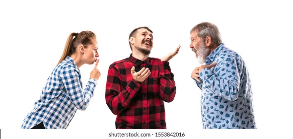 Family Members Arguing With One Another On White Studio Background. Concept Of Human Emotions, Expression, Conflict Of Generations. Woman And Men In Dispute. Half-length Portrait. Copyspace.